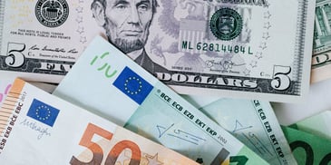 50 and 10 Euro and Dollar bills 