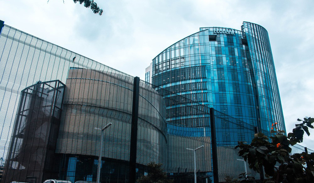 Blue and grey glass office buldings and blue sky